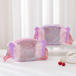 Pink and purple candy-themed children crossbody bags with glitter wings and rainbow straps