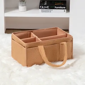 Caramel teddy fleece diaper caddy with multiple compartments and sturdy handles
