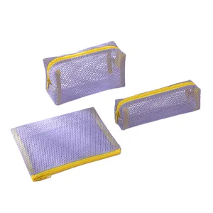 Detailed view of the 3-piece purple mesh storage set with yellow contrasting zippers