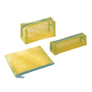Three-piece yellow mesh pouch set with blue zipper for stationery and cosmetics