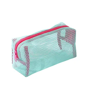Portable mint green nylon mesh organizer pouch with vibrant magenta zipper for storage
