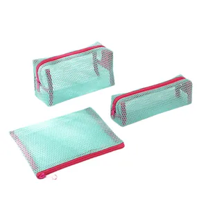 Three-piece mint green mesh storage bags with pink zippers for makeup and stationery