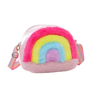 Detail of colorful plush rainbow crossbody bag with pink glitter leather and striped strap
