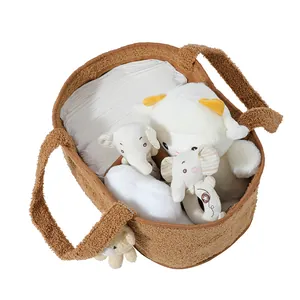 Detailansicht brauner Teddy-Fleece Baby-Aufbewahrungskorb mit verstärkten Griffen und Plüsch