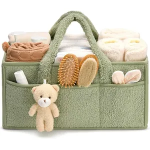 Green fleece diaper caddy organizer basket with side pockets and teddy bear decor
