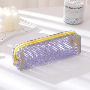 Portable purple mesh pencil case with yellow zipper for students and travel storage