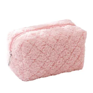 Pink plush pencil case made of fluffy lamb wool with silver metal zipper for stationery