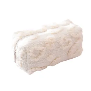 White plush heart pencil case with soft textured fabric and silver zipper closure
