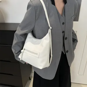 Sac hobo minimaliste en cuir blanc à motif litchi pour le style quotidien des femmes