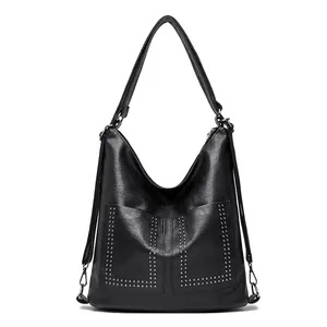 Zaino vintage nero da donna con borchie argentate e design a due tasche anteriori