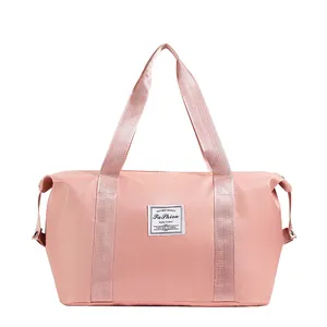 Pink large capacity travel bag for gym and sports with durable water resistant fabric
