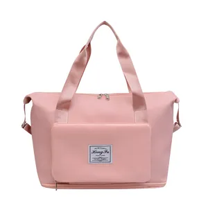 Pink large capacity sports gym bag with waterproof fabric and bottom expansion layer