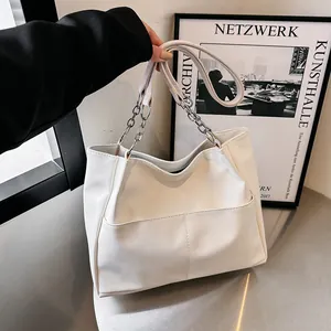 Fashionable off-white PU leather tote bag with large capacity and silver chain shoulder strap