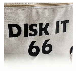Detail of off-white canvas tote bag featuring Disk It 66 print and gold zipper closure