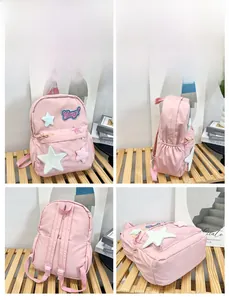 Detail view of pink backpack featuring star sequins and Omg! letter appliques from four angles