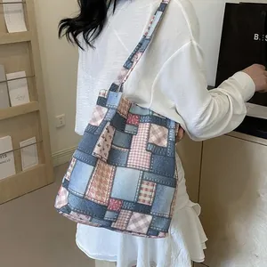 Vintage patchwork canvas tote bag with blue denim and pink plaid patterns for daily use