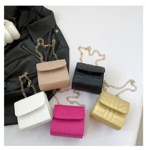 Collection of five colorful mini chain bags with geometric stitching and gold straps