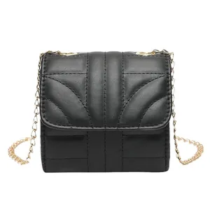 Chic black quilted crossbody bag with golden chain strap for 2024 spring and summer