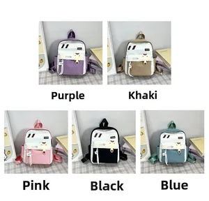 Collezione di zaini per la scuola nei colori viola, kaki, rosa, nero e blu per bambini