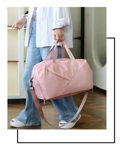 Pink multi-functional sports bag with wet-dry separation shown in a lifestyle travel setting