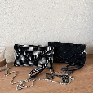 Fashionable diamond-studded envelope chain bag with silver rivets and sleek black finish