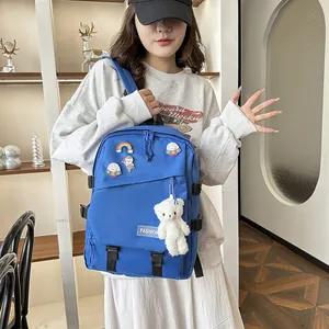 Sac à dos d'école bleu en nylon avec broches astronaute et pendentif ours en peluche