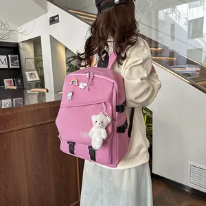Sac à dos d'école rose en toile avec patchs astronaute et porte-clé ours en peluche