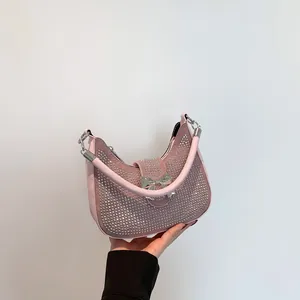Pink rhinestone hobo bag with silver bow buckle and faux leather strap for women