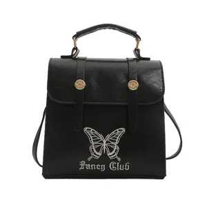 Vintage black leather backpack with butterfly embroidery and silver gothic fancy lettering