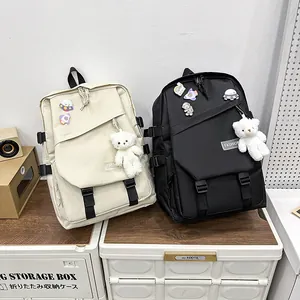 Sac à dos d'école minimaliste pour étudiants avec badges d'astronaute et charme d'ours