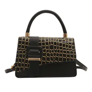 Classic black square shoulder bag with gold crocodile texture flap and top handle