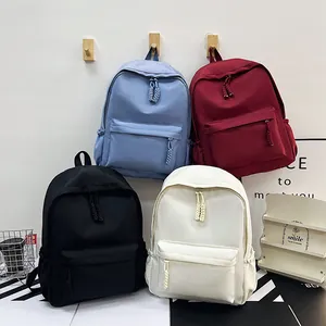 Sacs à dos minimalistes en nylon grande capacité en bleu, rouge, noir et beige élégant