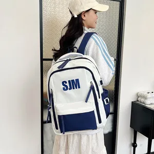 Blau-weißer Rucksack mit großem Fassungsvermögen, SJM-Aufdruck und vielen Taschen