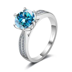 Detailed side view of S925 silver ring featuring blue moissanite and hollow pavé band