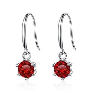 Detailed view of red moissanite drop earrings with six-prong setting in S925 sterling silver