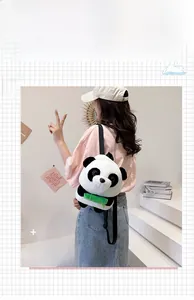 Toddler giant panda plush backpack with adjustable straps and green bamboo detail