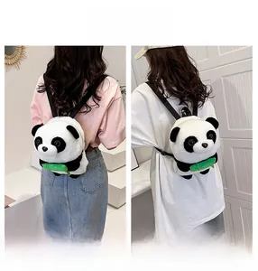 Detail of cute panda plush backpack featuring green bamboo accent and adjustable straps