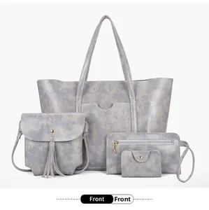 Detail of grey marble pattern 4-piece handbag set including tote and crossbody bag