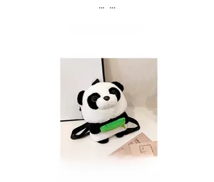 Detail of cute panda plush backpack featuring soft faux fur and green bamboo accent
