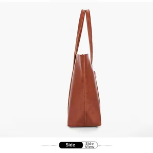 Side view of dark brown tote bag showing thickness and sleek leather texture