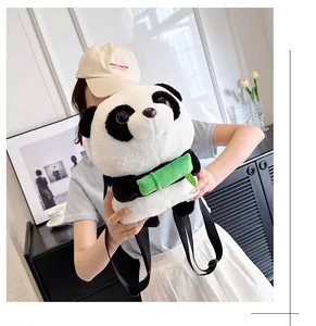 Detailed view of plush panda backpack with soft fur and decorative green bamboo