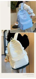 Detail of high-density waterproof nylon backpack with adjustable buckles and cute plush pendant