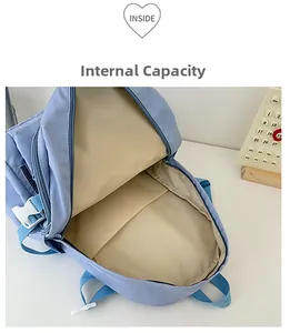 Detailed view of the light blue backpack spacious main compartment and interior lining