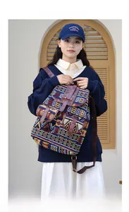 Close-up of bohemian tribal pattern backpack with durable canvas and leather straps