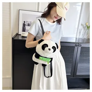 Detailed close-up of a plush panda backpack featuring soft faux fur and adjustable nylon straps