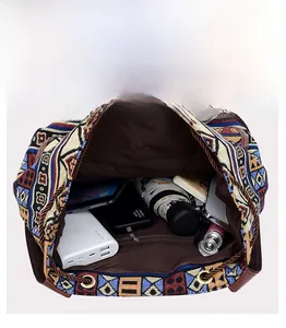 Top view of ethnic canvas backpack showing large capacity for iPad, books and cosmetics