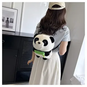 Rear view of a cute plush panda backpack with bamboo detail worn by a child