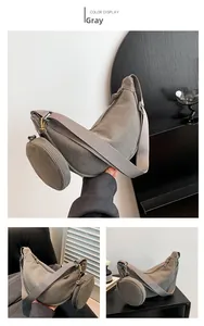 Grey corduroy crescent bag with matching mini round pouch and wide textile shoulder strap