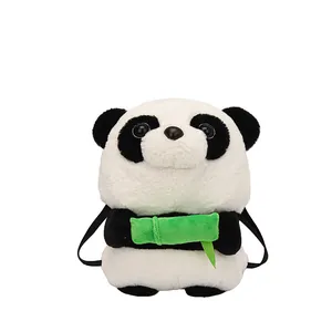 Cute panda plush backpack for kids with soft black and white fur holding green bamboo toy