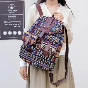 Ethnic vintage canvas backpack with geometric patterns and brown leather accents